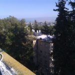 The view of the Haifa bay from the roof, other solar collectors and scary fact there is no fence to hold you from falling! =o Solar Water Heating System