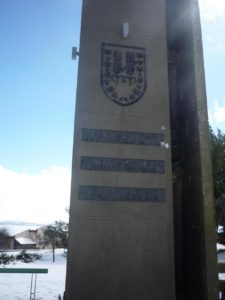 02222015-01 - The legs of the memorial with the symbol of Harel Brigade - Snow