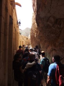 The main corridor of the Cartanel: On one side the rock and on the other doors to rooms of pilgrims who want to meditate