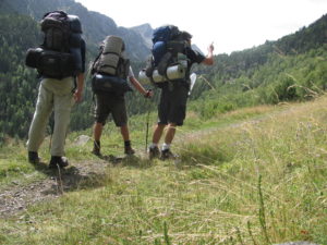 Israelis with big backpacks in Aigüestortes i Estany de Sant Maurici National Park