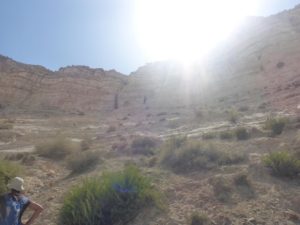 Atzva getting ready to climb the cliff (don't worry, there are steps and ladders) - Ein Ovdat