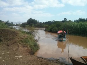 The boat crossing the Blue Nile in the end of the trail. - Blue Nile falls 