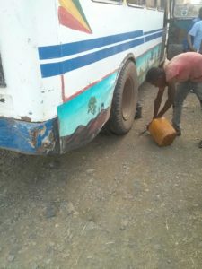 On the way back from the Waterfalls - Changing a tire. (that's how a 1.5 hour ride becomes 3 hours ride )