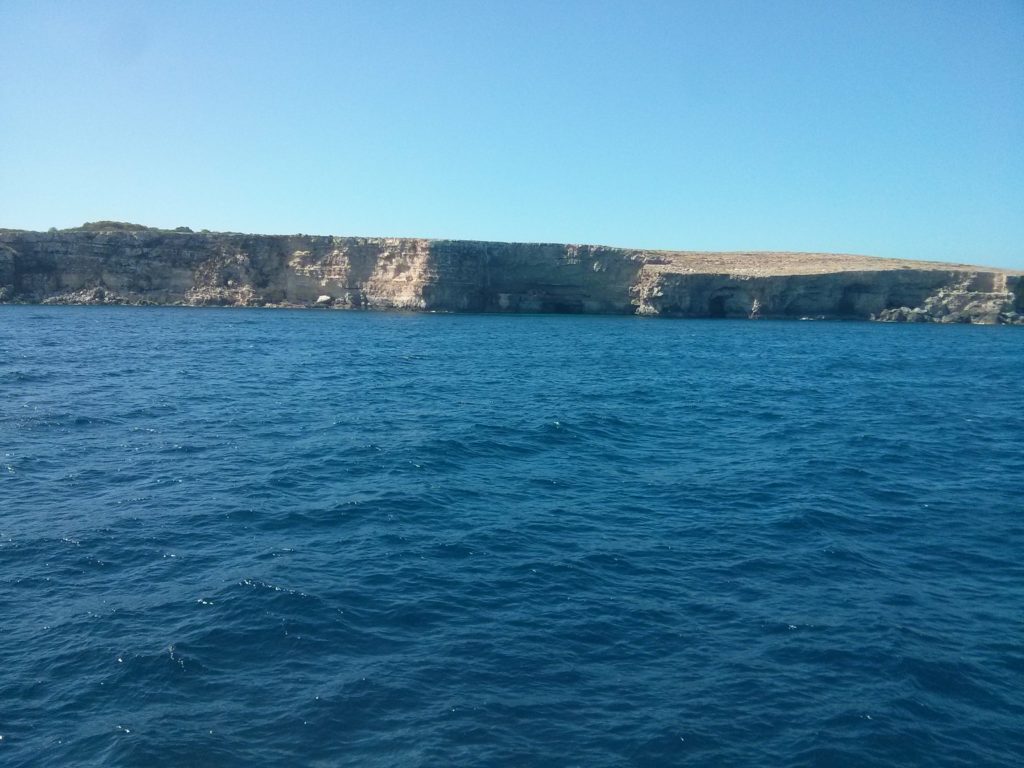 The cliffs on the North-East of Malta main island - Comino