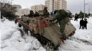APC in the snow - Jerusalem under siege in the blizzard of 2014