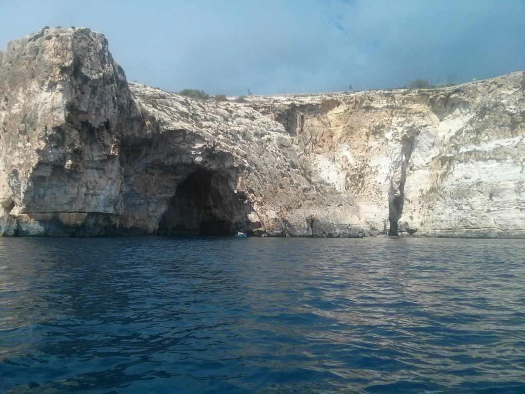 The blue grotto and rock just about to slide down to the sea 