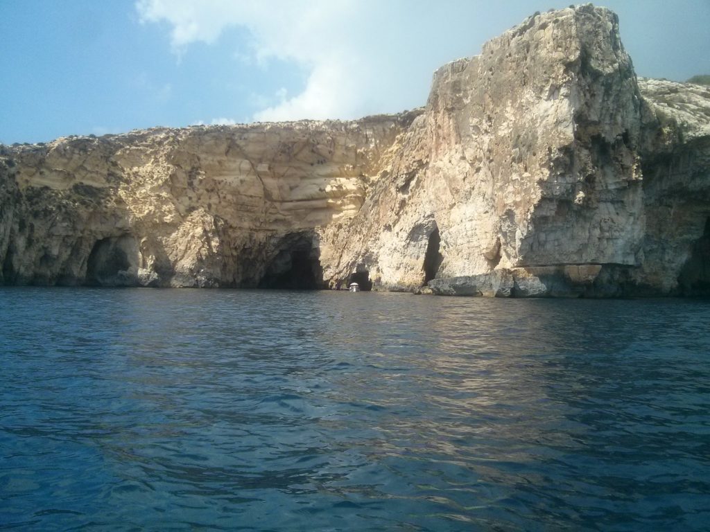 The blue grotto and rock just about to slide down to the sea 