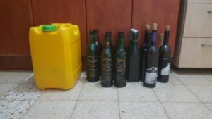 The olive oil jerrycan and the bottles we use to store the oil in. It is said that it is best to hold the oil in glass bottles and in dark place (or dark glass).