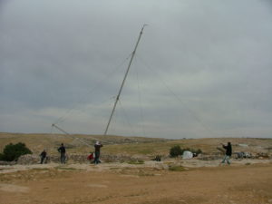 Taking down the mast to install the mast