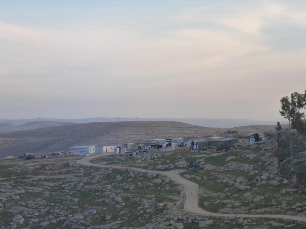 Looking east from the settlement of Carmel on the edge of the desert and the Mountains of Jordan