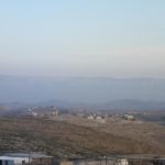 Looking east from the settlement of Carmel on the edge of the desert and the Mountains of Jordan