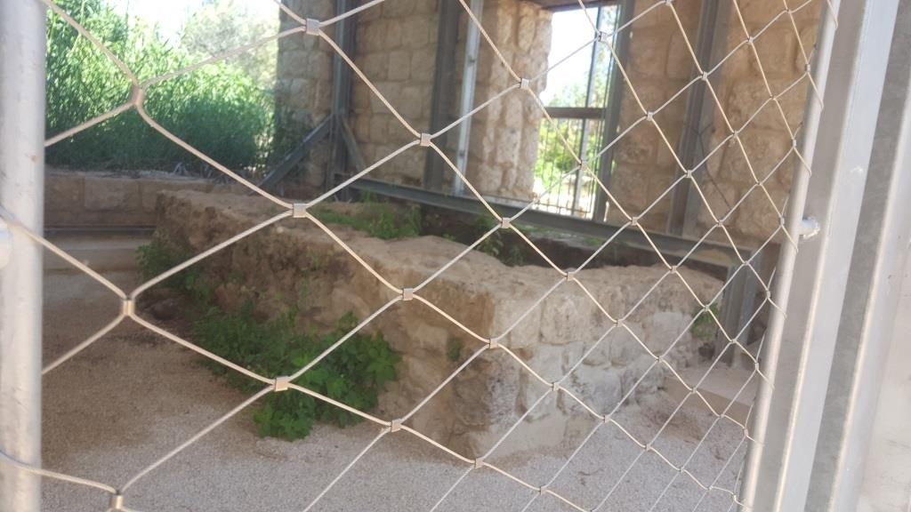 A new reconstructed flour mill with the millstone. The top is a rock from the Golan Heights while the bottom one is a local limestone.