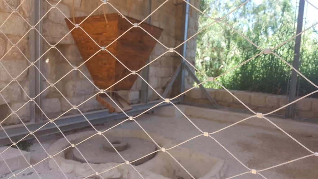 A new reconstructed flour mill with the millstone. The top is a rock from the Golan Heights while the bottom one is a local limestone.