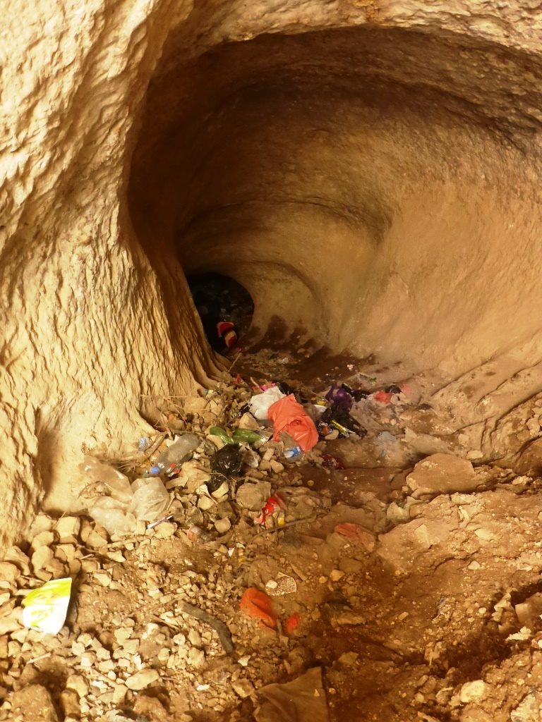 Going down the tunnel staircase of 93 stairs, leading to the spring. Unfortunately, it is full of rubbish - Tel Gibeon