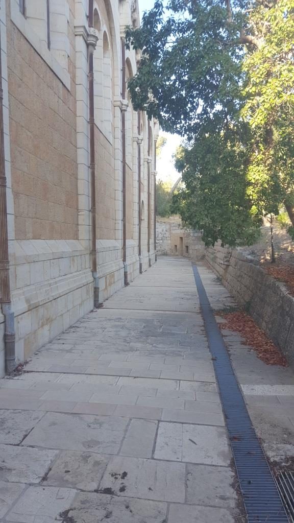 Along the wall of Saint-Etienne basilica