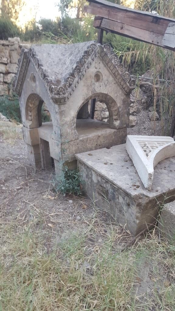 A chimney cover near the cistern in Saint-Etienne basilica garden