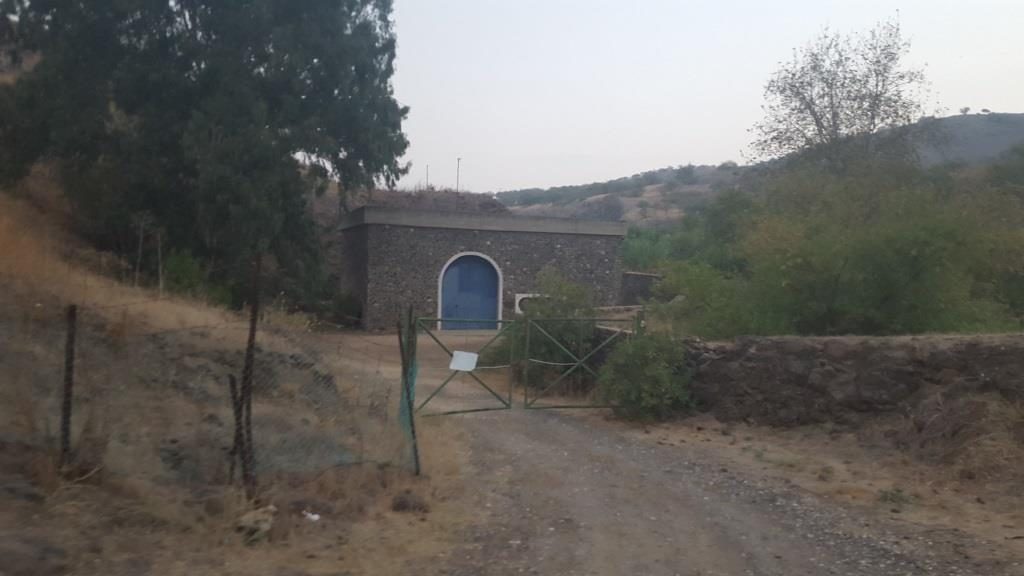 Front view of the power plant - raging jordan river