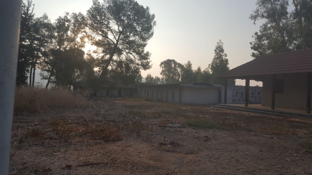 An abandon IDF base on the other side of road.  A visitor center is planned to be set on those building. Mishmar HaYarden