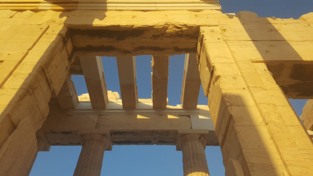 Marble slabs on stone beams on bigger beams on massive columns