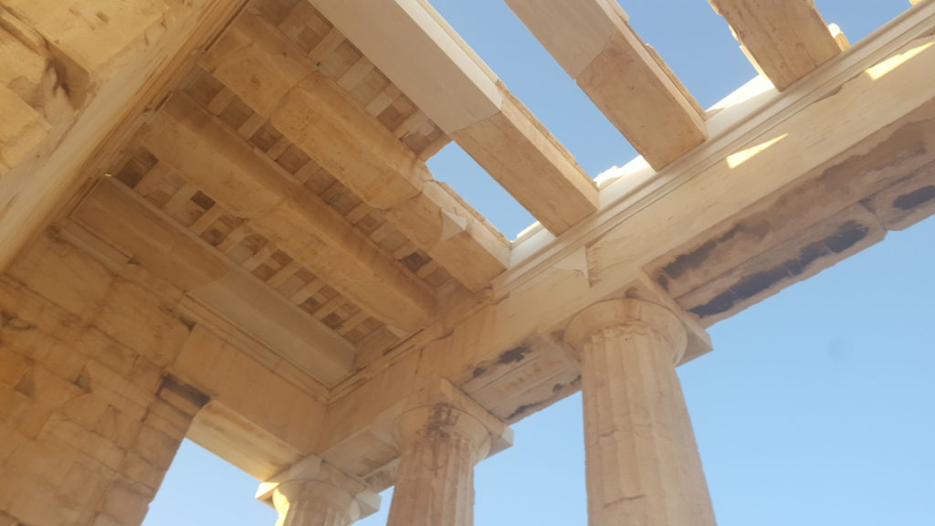 Marble slabs on stone beams on bigger beams on massive columns