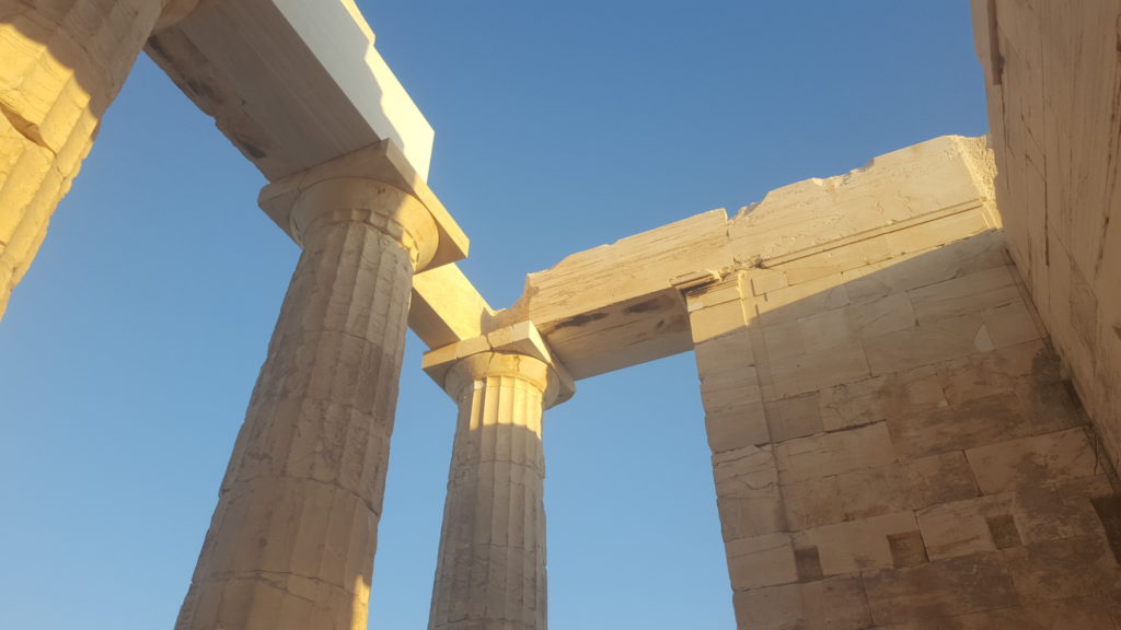 Marble slabs on stone beams on bigger beams on massive columns