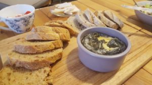 Melted Brie cheese - On the plate with some bread