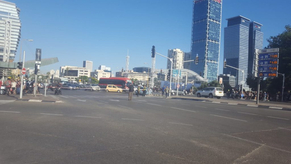 Policeman around the junction, and police tape closing the are for vehicles - Ethiopian riots