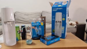 The Soda stream package - with bottles and concentrate 7up and Pepsi samples