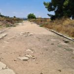 The Cardo meets the fortress, Along the Cardo and the columns heads that were found here - Tel Afek