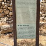 Running into Tel Afek fortress and sign at the entrance