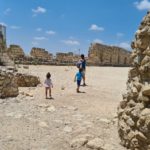 Running into Tel Afek fortress and sign at the entrance