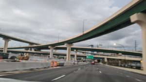 5 levels of bridges on the interchange (as the picture was taken one level above ground). Very complicated not only to design, but also to design the construction and go build. - American construction