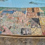 The scenes on the mosaic on the curve around the fountain