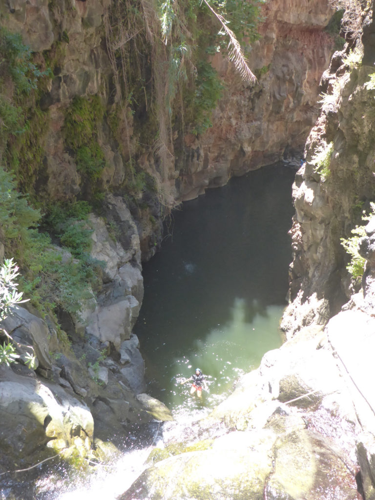 Rappelling down the third waterfall - 20m high with positive slope. On the bottom there is a 50m long pool