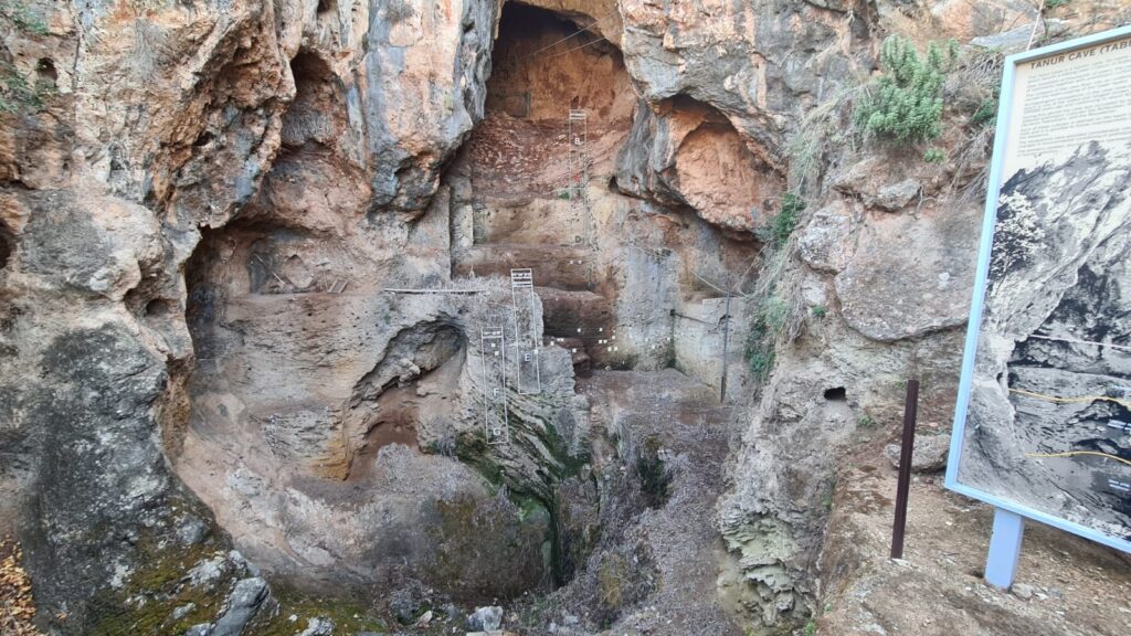 A rock hold by steel cables just above the trail - Nahal Me'arot