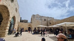 The castle courtyard now hosts a coffee shop - Migdal Tsedek