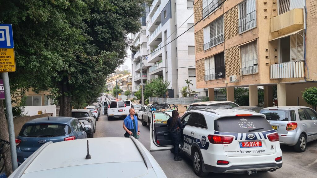 Our street closed by policeman to check if the car as a bomb in it