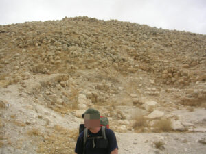 Nathan with what is left of the fortress on top of the hill