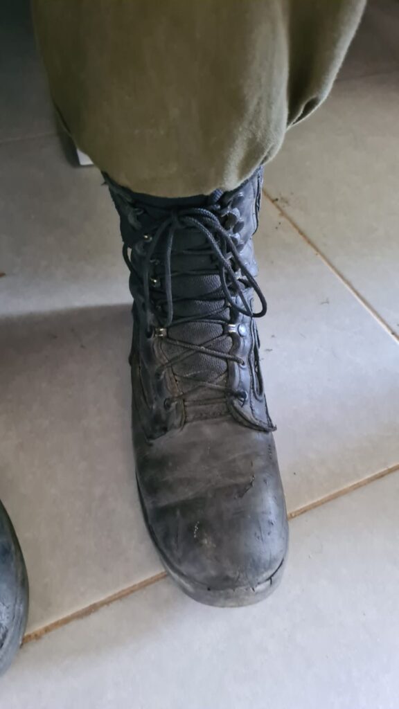 The newer IDF shoes just being tied up with a regular shoelace knot