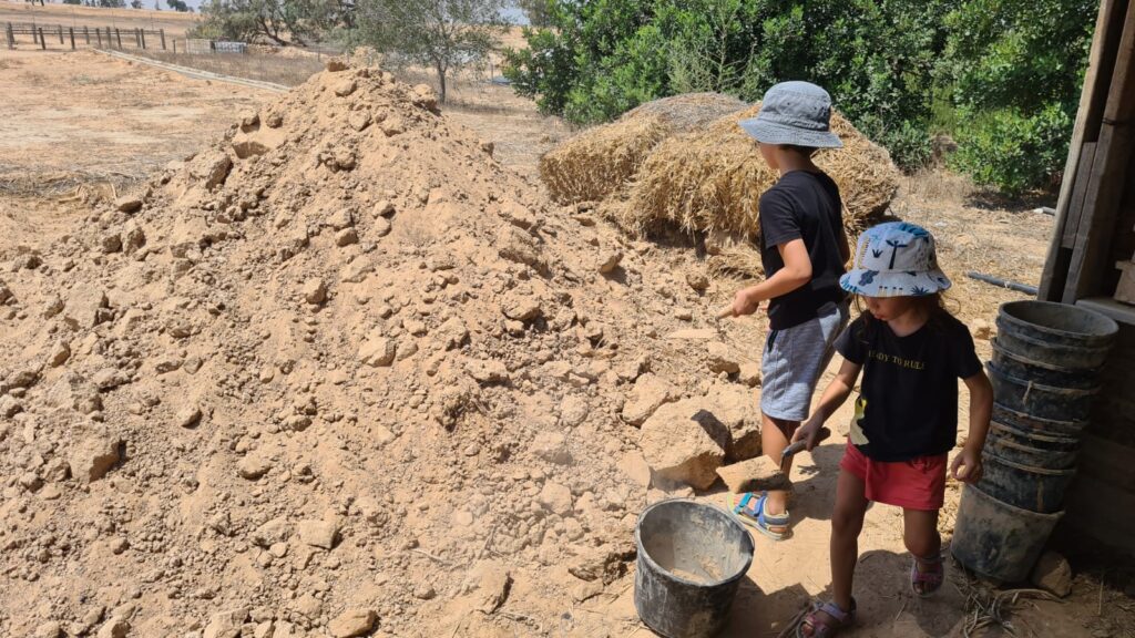 Making adobe stones, the same that used to build the living building