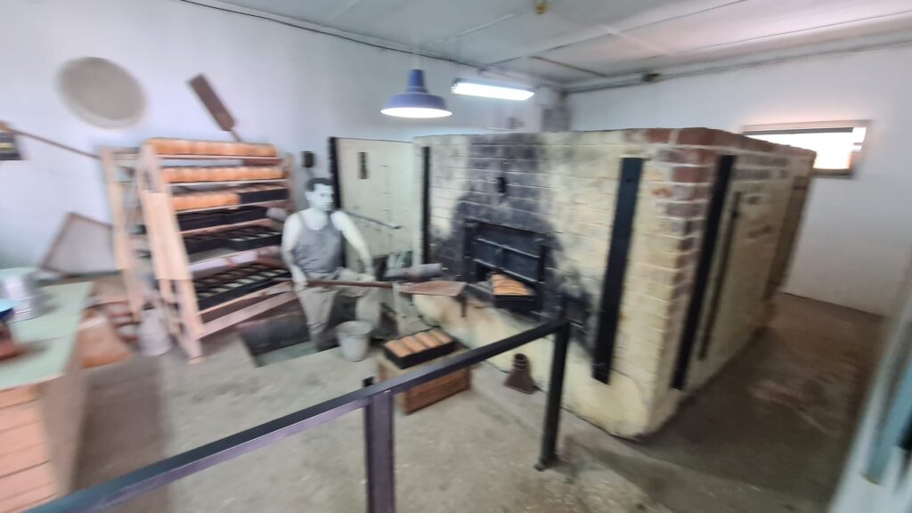 The bakery produced bread for the Kibbutz and Rehovot. The 10 ton oven had rails and covered a bigger access open to the factory which was only used 3 times: to get the machinery in, to once upgrade it and to pull the machinery out. The chimeny used to hid the  pollution from the factory.