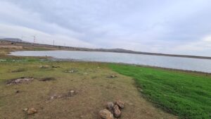 look on the reservoir and Golan Heights wind turbines