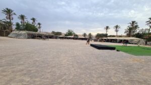 The main camping square of Kfar HaNokdim, where you make campfire at night