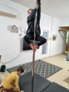 Climbing the dancing pole