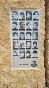 The name and pictures of the fallen soldiers, Israel flag, IDF sign and the Yum Kippur war