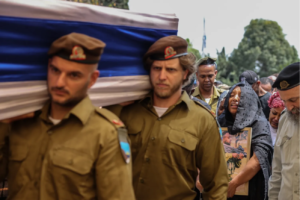 The funeral of Master sergeant (res.) Kalkidan Mehar z"l who died from a tank fire 2 weeks ago along with Master sergeant (res.) Ido Aviv - forces