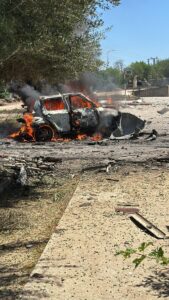 Shredded cars from the rocket explosion - Burkan