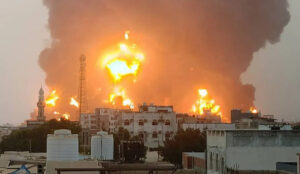 The burning flames of the oil depots after the attack (Source: Haaretz.co.il) - Outstretched Arm