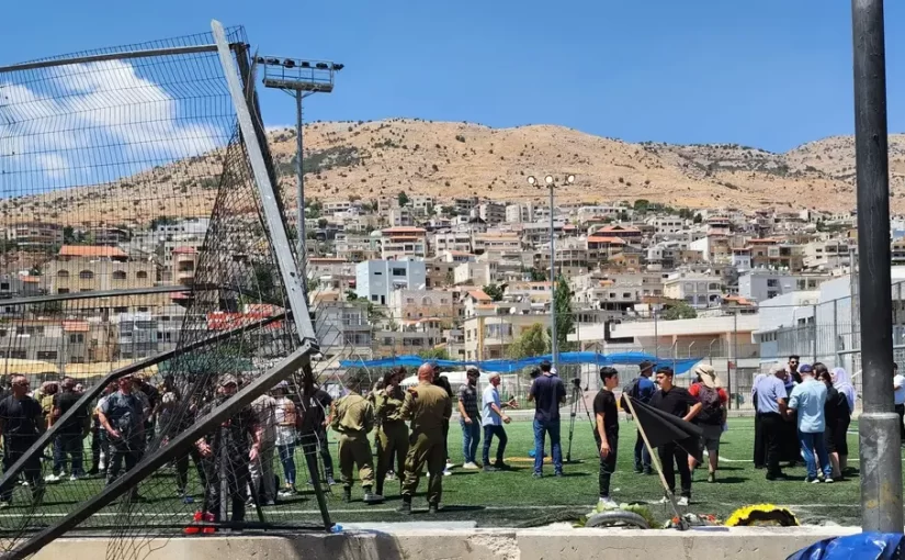 The football field where the rocket hit and killed 12, mostly children