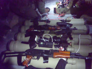 AK-47 rifles and Kornet missiles in another location